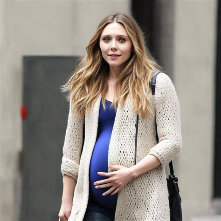 Elizabeth Olsen Pretending Pregnant 41 by jerry999999 on DeviantArt