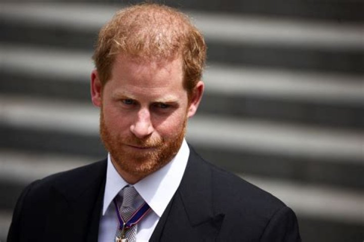 Prince Harry Accused Of Wearing Heels In New Photo With John Travolta