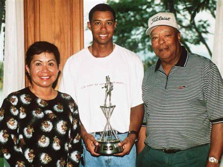 Raymond Jimenez with his mother and wife's family