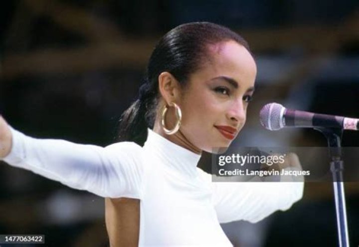 Sade's (Helen Folasade Adu) beautiful freckled face portrait