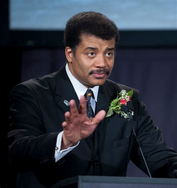 See Neil deGrasse Tyson TrashTalking Pluto! Parade